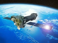 Artist's impression of XMM-Newton spacecraft in orbit around the Earth. The X-ray emission from galaxy SDSS J120136.02+300305.5 was detected in slew modus of the space observatory.