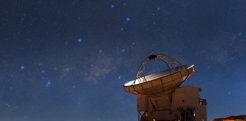 The Atacama Pathfinder Experiment (APEX) telescope sits atop the plateau of Chajnantor in the Chilean Andes, more than 5,100 metres high. To the left of APEX is the central region of the Milky Way, where the supermassive black hole Sagittarius A* lurks.