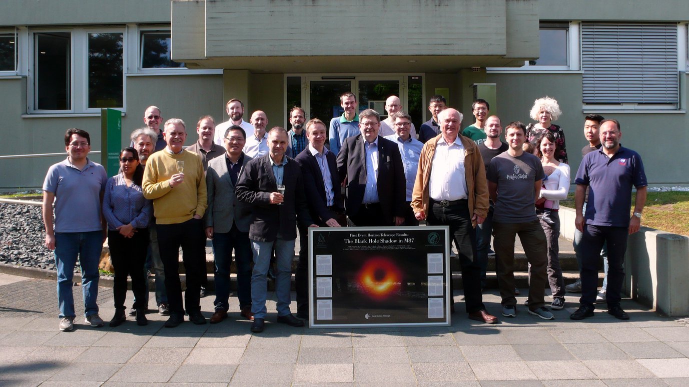 Members of the Event Horizon Telescope Collaboration team, during a special event in late April 2019 at the MPI für Radioastronomie. From left to right: Sergio Dzib, Gisela Ortiz, Andrei Lobanov, Dirk Muders, Walter Alef, Stefan Heyminck, Christian M. Fromm, RuSen Lu, Alan L. Roy, J. Anton Zensus, Aris Noutsos, Michael Kramer, Robert Wharton, Karl Menten, Ralf Eatough, Helge Rottmann, Kuo Liu, Thomas P. Krichbaum, Jun Liu, Sven Dornbusch, Jan Wagner, Silke Britzen, Anne-Kathrin Baczko, Jae-Young Kim, and Eduardo Ros.