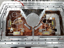 View inside the NFLASH facility cryostat: 230 GHz channel with waveguide LO feed (left) and 460 GHz channel with optical LO feed (right).