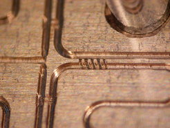 Waveguide structure (WR-1.2) of 2SB mixer blocks for 780-950 GHz: Branchline hybrid coupler (center) with smallest milling path of 55µm.