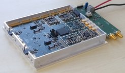 Photo of the CryoPAF digitizer with power and signal supply circuit board.